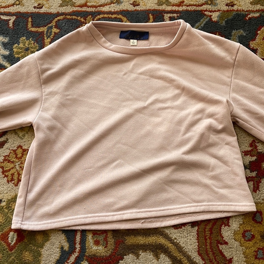 Light Pink Crew with Ruffle and Pearl Detailing on the sleeve!